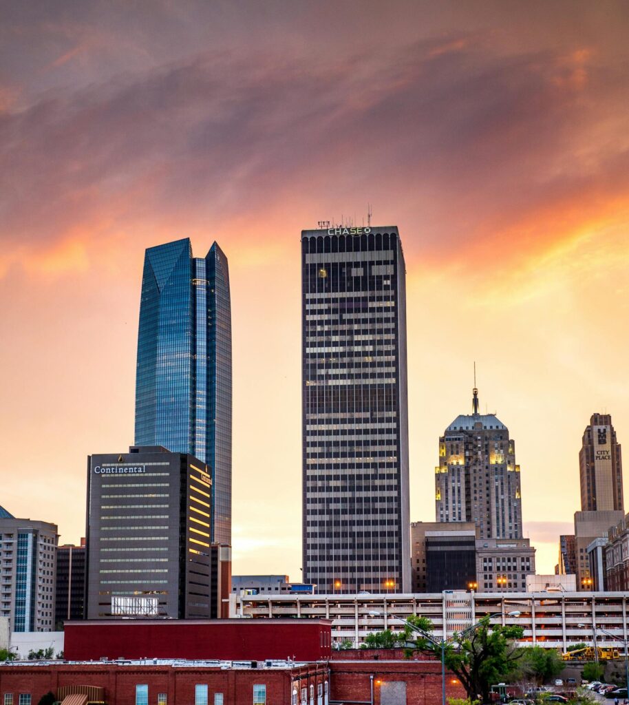Stunning skyline view of Oklahoma City with dramatic sunset colors